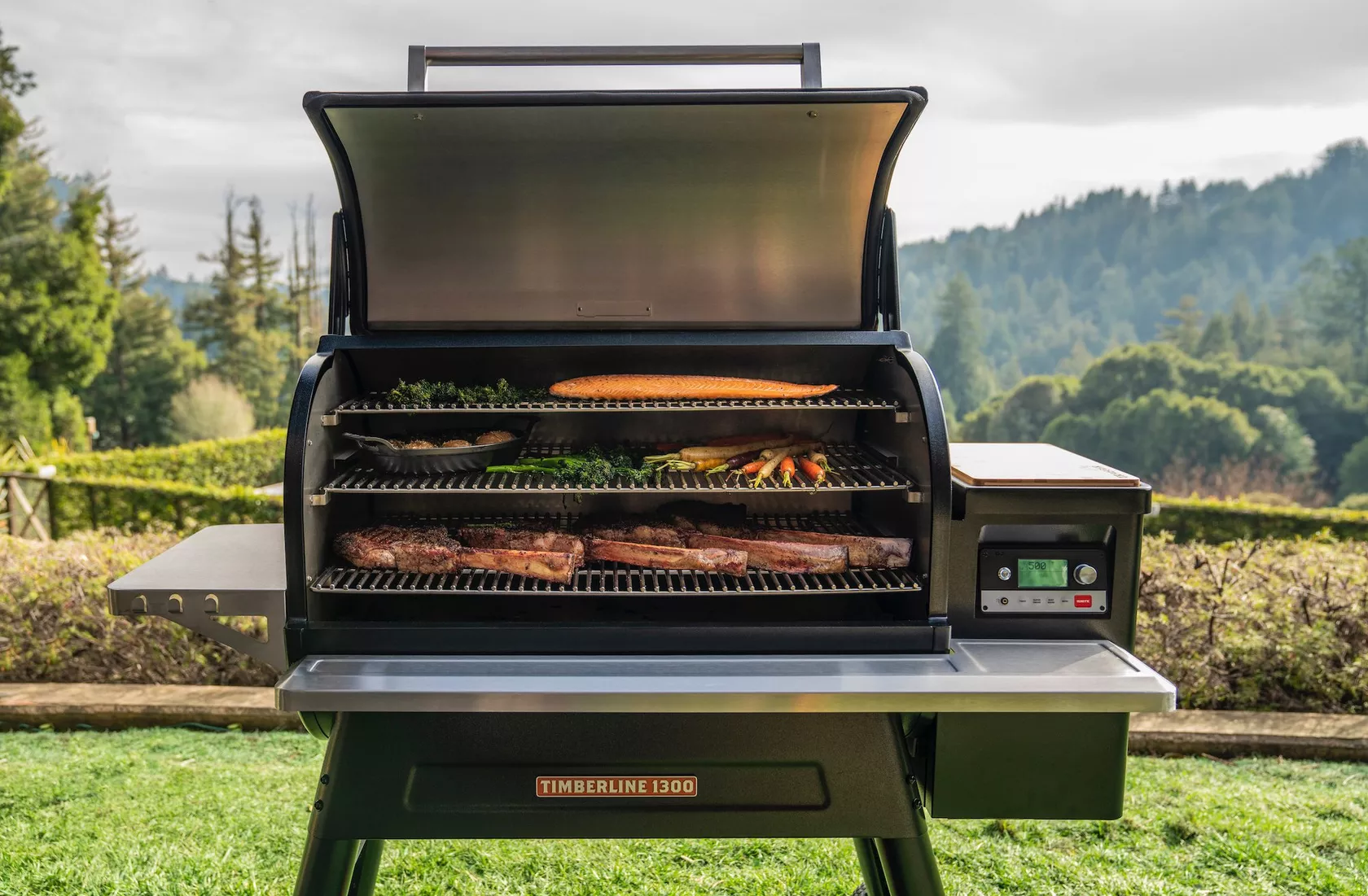 Front Page -Prime Heat traeger timberline 1300 pellet grill lifestyle lid open